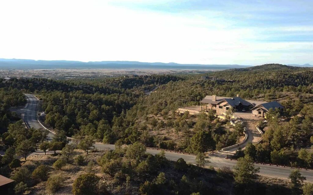 Aerial view of a custom home in The Preserve with west-facing Williamson Valley views and distant Granite Mountain.