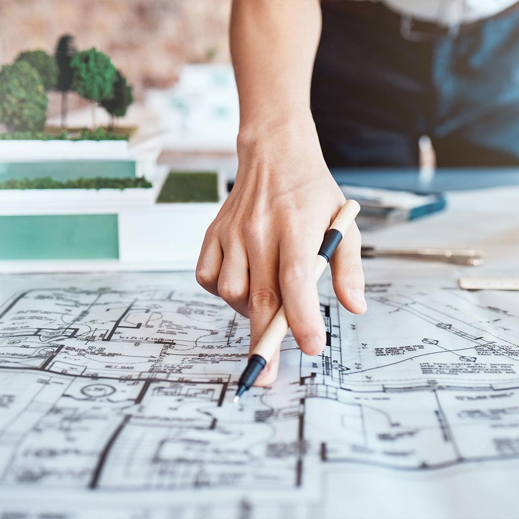 Builder reviewing custom home plans to align a Prescott home design with lifestyle, daily use, and site planning